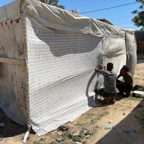 Displaced Palestinians, evacuated from Rafah